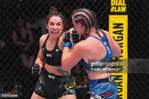 Norma Dumont of Brazil punches Chelsea Chandler in their featherweight fight during the UFC Fight Night at UFC APEX on July 15, 2023 in Las Vegas,...