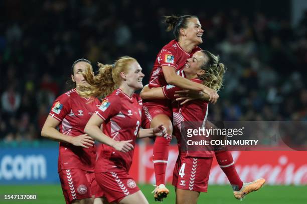 Denmark players celebrate scoring their first goal during the Australia and New Zealand 2023 Women's World Cup Group D football match between Denmark...