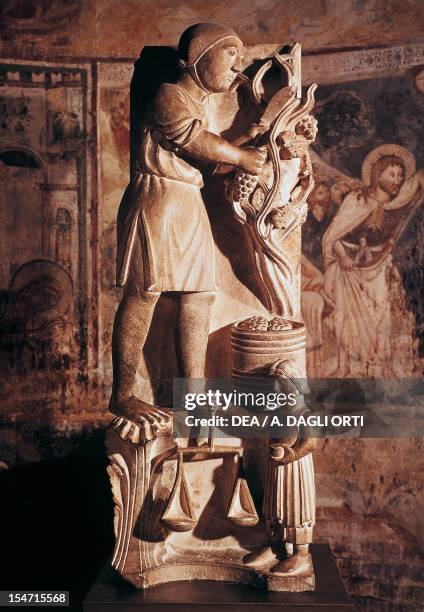 September, sculpture from the Cycle of Months, by Benedict Antelami , Baptistery of Parma, Emilia-Romagna. Italy, 12th-13th century.