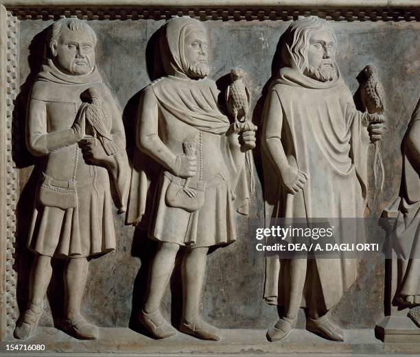 Falconers, detail of the tomb of Raimondo del Balzo, relief by the School of Bertini, Basilica of Santa Chiara, Naples , Campania. Italy, 14th...