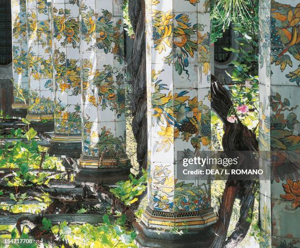 Columns decorated with majolica tiles, Cloister of the Poor Clares by Domenico Antonio Vaccaro , Basilica of Santa Chiara, Naples , Campania. Italy,...