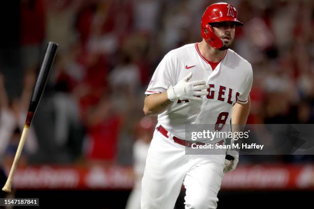 Mike Moustakas of the Los Angeles Angels reacts after hitting a three-run homerun during the seventh inning of a game against the Houston Astros at...