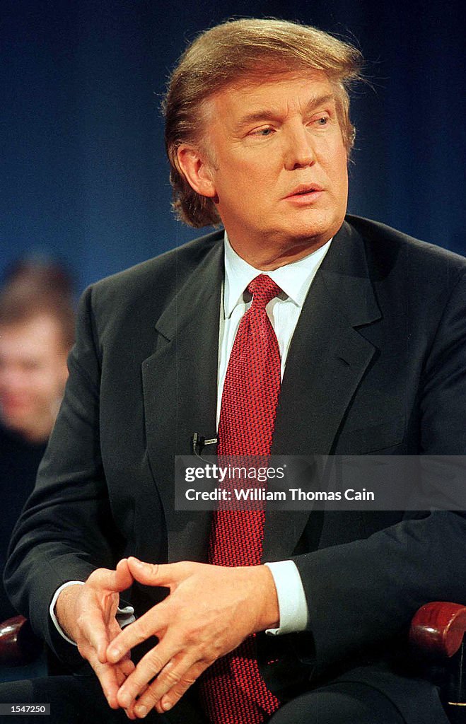 Donald Trump Listens To A Question During A Break In The Taping Of