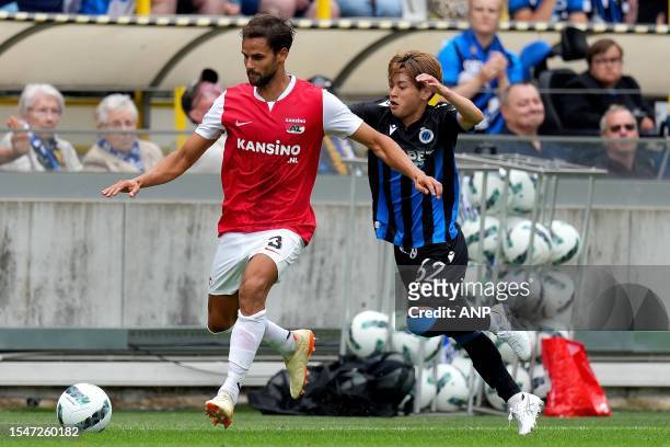 Pantelis Hatzidiakos of AZ Alkmaar, Shion Homma of Club Brugge during the friendly match between Club Brugge and AZ Alkmaar at the Jan Breydel...