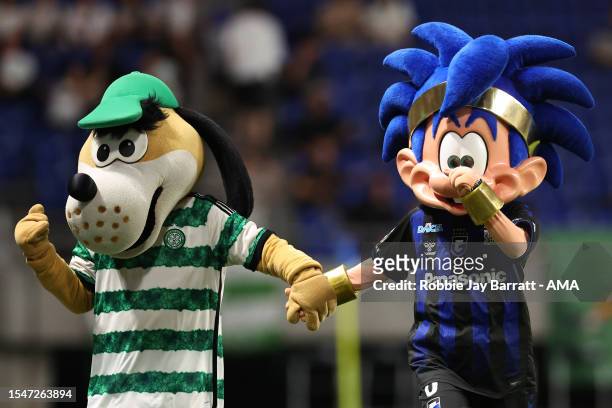 Lobby, Gamba Osaka mascot and Hoopy the Huddle Hound, Celtic mascot during the preseason friendly between Celtic and Gamba Osaka at Panasonic Stadium...