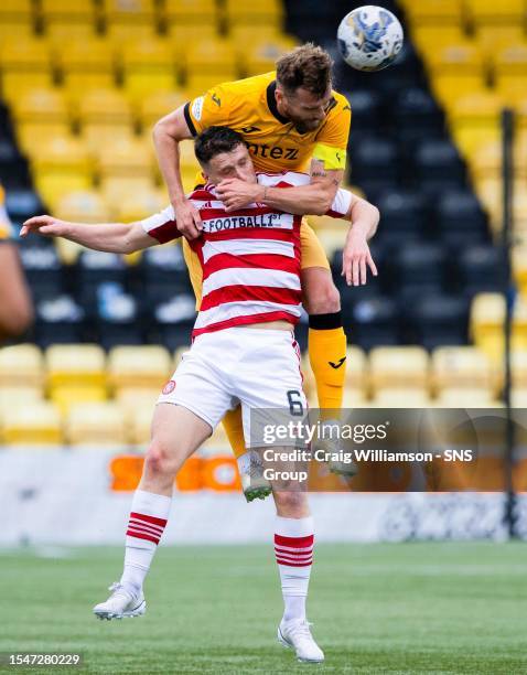 Livingston's Mikey Devlin and Hamilton's Jamie Barjonas during a Viaplay Cup group stage match between Livingston and Hamilton Academical at the Tony...