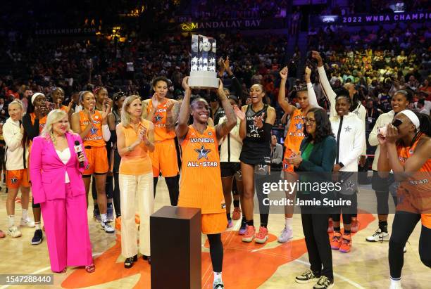 Jewell Loyd of Team Stewart lifts the trophy after being named the MVP of the 2023 WNBA All-Star game at Michelob ULTRA Arena on July 15, 2023 in Las...