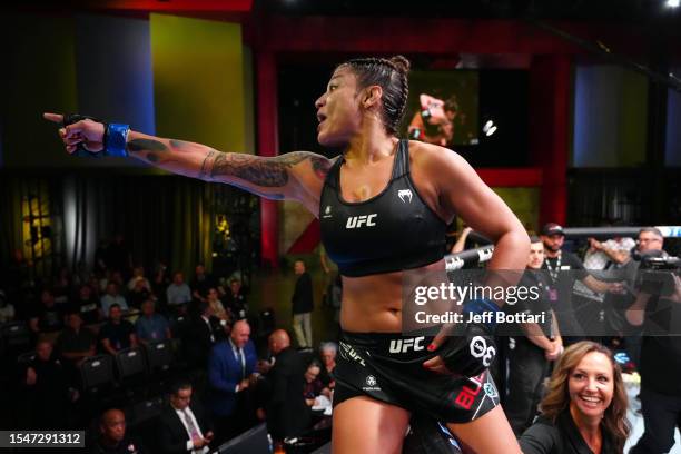 Mayra Bueno Silva of Brazil reacts after her submission victory over Holly Holm in their women's bantamweight fight during the UFC Fight Night at UFC...