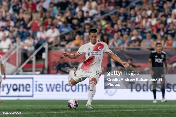 Bobby Wood of New England Revolution passes the ball during a game between D.C. United and New England Revolution at Gillette Stadium on July 15,...