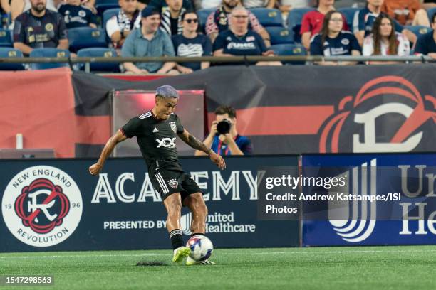 Andy Najar of D.C. United crosses the ball during a game between D.C. United and New England Revolution at Gillette Stadium on July 15, 2023 in...