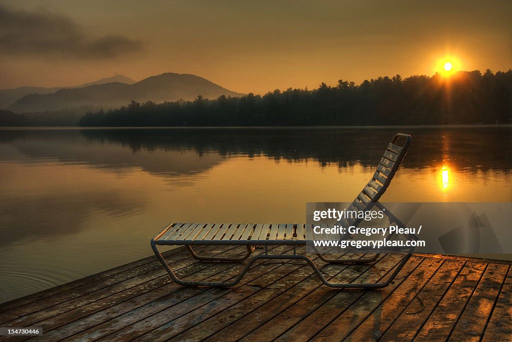 Mirror Lake at Dawn with Chaise Lounge on Dock