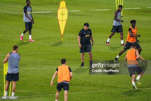 Tottenham Hotspur manager Angelos Postecoglou leads his team's training session for the pre-season tour soccer match between Tottenham Hotspur and...