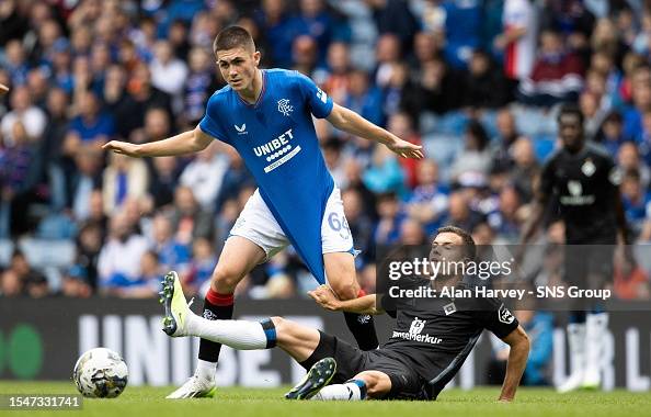 Bariley Rice Rangers' Bailey Rice is pulled down by Hamburg's László Bénes during ...