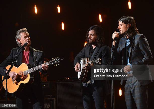 Randy Travis, Scott Avett and Seth Avett perform during CMT Crossroads: The Avett Brothers And Randy Travis tape at The Factory, Liberty Hall in...