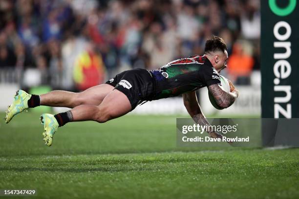 Charnze Nicoll-Klokstad of the Warriors scores a try during the round 20 NRL match between the New Zealand Warriors and the Cronulla Sharks at Mt...