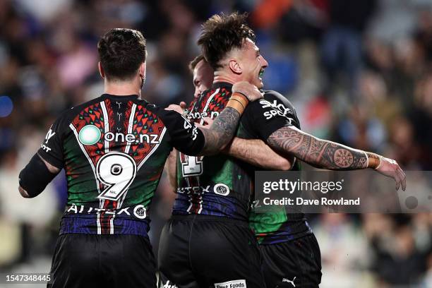 Charnze Nicoll-Klokstad of the Warriors celebrates his try during the round 20 NRL match between the New Zealand Warriors and the Cronulla Sharks at...