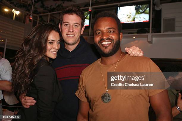Model Natalie Martinez, journalist Ben Lyons and tv host Sal Masekala attend Maxim and Rock the Vote's celebration of the launch of Assassins Creed...