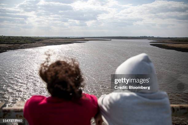 Visitors view low water levels at the Paso Severino reservoir during a drought in Florida, Uruguay, on Friday, July 21, 2023. Paso Severino, the main...
