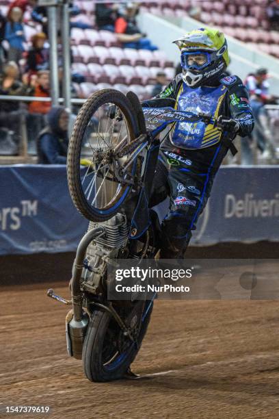 Ashton Boughen celebrates with a wheelie during the National Development League match between Belle Vue Colts and Edinburgh Monarchs Academy at the...