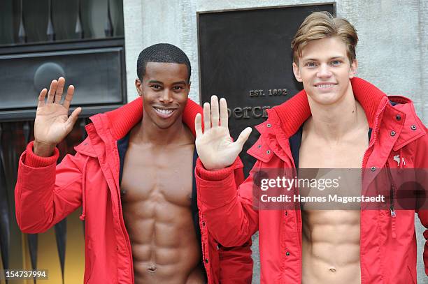 Male models outside Abercrombie & Fitch during the opening of Abercrombie & Fitch flagship store on October 25, 2012 in Munich, Germany.
