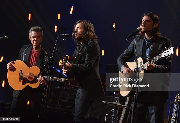 Randy Travis, Scott Avett and Seth Avett perform during CMT Crossroads: The Avett Brothers And Randy Travis tape at The Factory, Liberty Hall in...