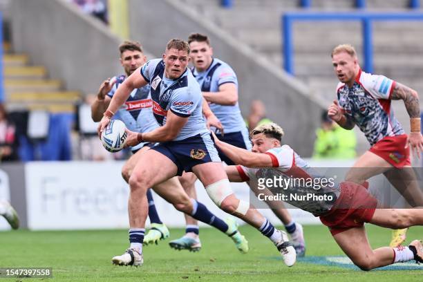 Morgan Knowles of St Helens makes a pass during the Betfred Challenge Cup Semi-Final between Leigh Leopards and Saint Helens at the Halliwell Jones...
