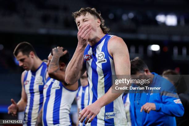 Dejected Nick Larkey of the Kangaroos leave the ground after the round 18 AFL match between North Melbourne Kangaroos and Hawthorn Hawks at Marvel...