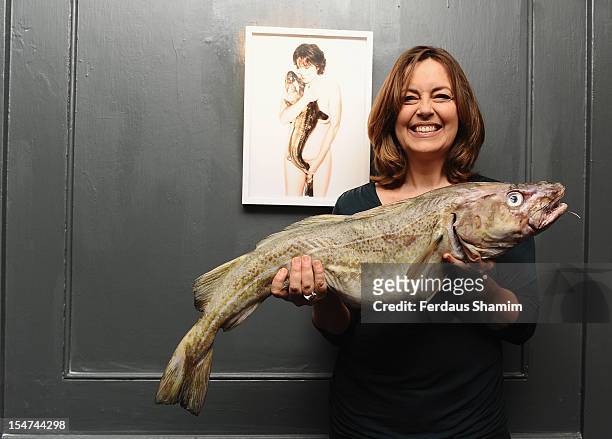Greta Scacchi attends a photocall ahead of the private view of Rankin: Fishlove on October 25, 2012 in London, England.