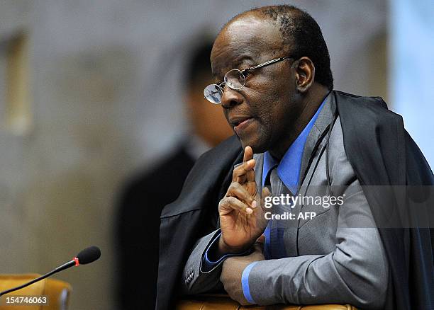 Brazilian Supreme Court's judge Joaquim Barbosa takes part in a session of the 'Mensalao' trial, in Brasilia, Brazil, on October 25, 2012. Brazil's...