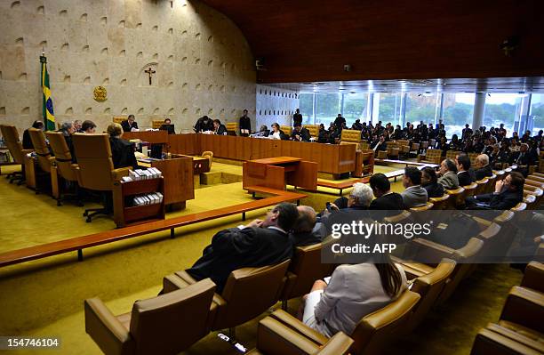 Brazilian Supreme Court's jugdes work during a session of the 'Mensalao' trial, in Brasilia, Brazil, on October 25, 2012. Brazil's biggest bribery...