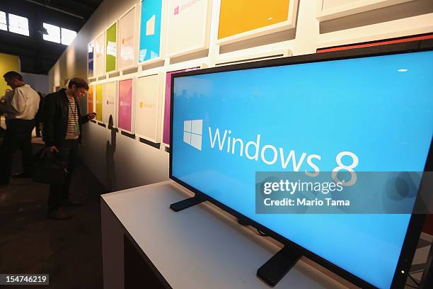 Screen displays the logo of the Microsoft Windows 8 operating system at a press conference for the launch of the system on October 25, 2012 in New...