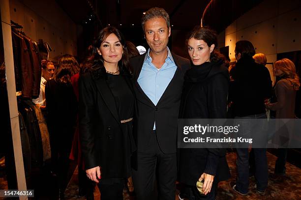 Nadine Warmuth, Nikolaus Weil and Anja Carina Schabel attend the opening of the 'Peuterey' store on October 25, 2012 in Berlin, Germany.