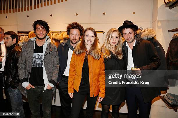 Burak Yigit, Ceci Chuh, Anna Herrmann and Bjoern von der Wellen attend the opening of the 'Peuterey' store on October 25, 2012 in Berlin, Germany.