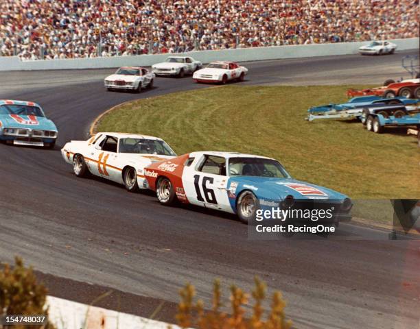 April 27, 1975: Bobby Allison , driving Roger Penske’s AMC Matador, leads Cale Yarborough’s Junior Johnson Chevrolet and Richard Petty’s Dodge during...