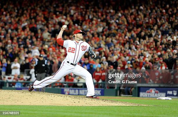 Drew Storen of the Washington Nationals pitches against the St. Louis Cardinals in Game Five of the National League Division Series at Nationals Park...