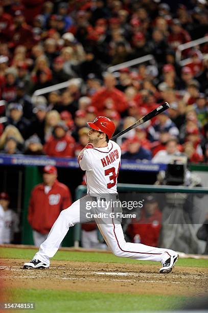 Bryce Harper of the Washington Nationals bats against the St. Louis Cardinals in Game Five of the National League Division Series at Nationals Park...