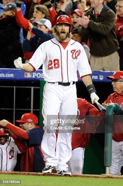 Jayson Werth of the Washington Nationals celebrates after the Nationals score a run against the St. Louis Cardinals in Game Five of the National...