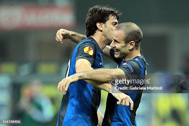 Rodrigo Palacio and Diego Milito of FC Internazionale Milano celebrate after scoring a goal during the UEFA Europa League group H match between FC...