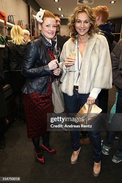 Enie van de Meiklokjes and Caroline Beil attend the 'Le Tanneur' store opening at Quartier 207 on October 25, 2012 in Berlin, Germany.