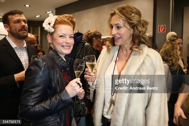 Enie van de Meiklokjes and Caroline Beil attend the 'Le Tanneur' store opening at Quartier 207 on October 25, 2012 in Berlin, Germany.