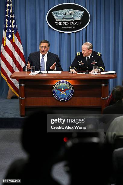 Secretary of Defense Leon Panetta and Chairman of the Joint Chiefs of Staff General Martin Dempsey participate during a news briefing October 25,...