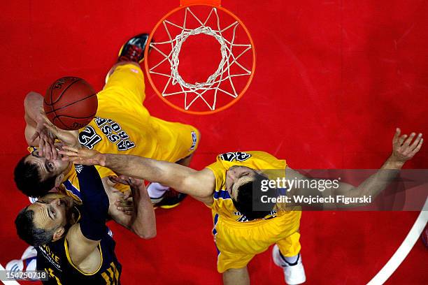 Rasid Mahalbasic, #12 and Adam Hrycaniuk, #34 of Asseco Prokom Gdynia competes with Sven Schultze, #6 of Alba Berlin during the 2012-2013 Turkish...