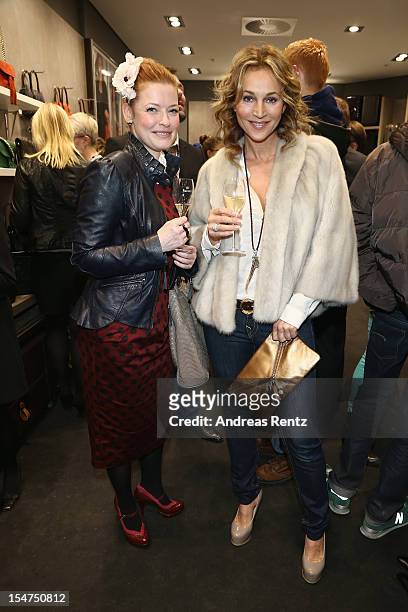 Enie van de Meiklokjes and Caroline Beil attend the 'Le Tanneur' store opening at Quartier 207 on October 25, 2012 in Berlin, Germany.