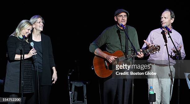 James Taylor, second from right, performed a concert at the Citi Emerson Colonial Theatre in support of the candidacy of Elizabeth Warren, second...