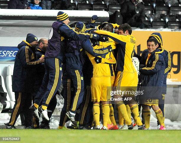 Metalist's players celebrate after winning during the UEFA Europa League Group K football match Rosenborg BK vs FC Metalist Kharkiv in Trondheim, on...