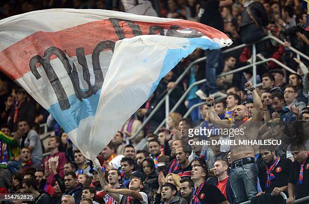 Supporters of Steaua Bucharest cheers during the UEFA Europa League Group E football match FC Steaua Bucaresti vs Molde FK in Bucharest, on October...