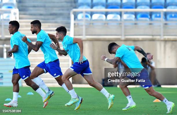 Fran Navarro of FC Porto with teammates in action during the warm up before the start of Pre-Season Friendly match between Cardiff City FC and FC...