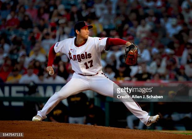 Anaheim, CA Evening sunlight illuminates Angels starting pitcher and two-way player Shohei Ohtani as he delivers a pitch in the third inning against...
