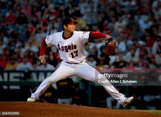 Anaheim, CA Evening sunlight illuminates Angels starting pitcher and two-way player Shohei Ohtani as he delivers a pitch in the third inning against...