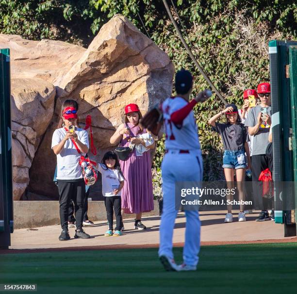 Anaheim, CA Fans get an exclusive close-up view of Angels starting pitcher, two-way player and designated hitter Shohei Ohtani warming up in the...